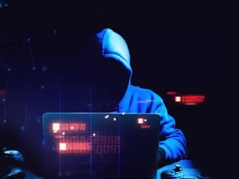 Blog Thumbnail Wide hacker on a laptop planning organized crime