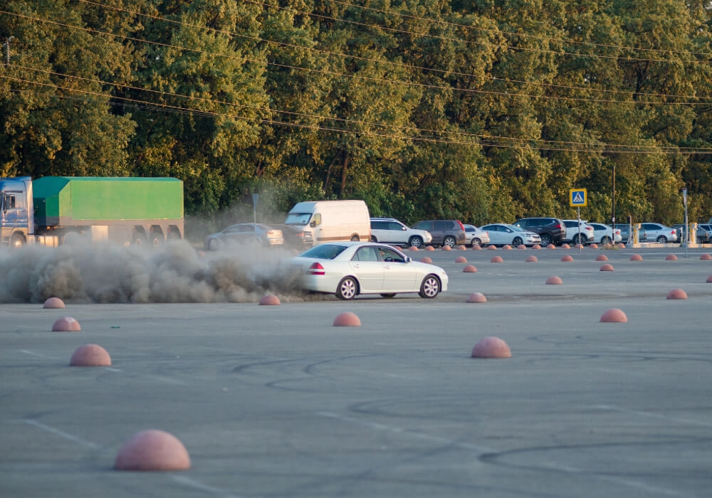 Vehicle Doing Donuts in Parking Lot