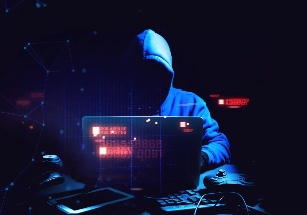 Hacker on a PC organising a crime