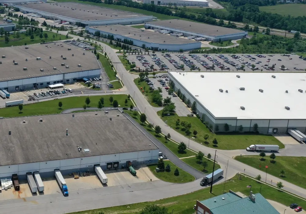 Distribution centers with trucks coming collecting and delivering goods