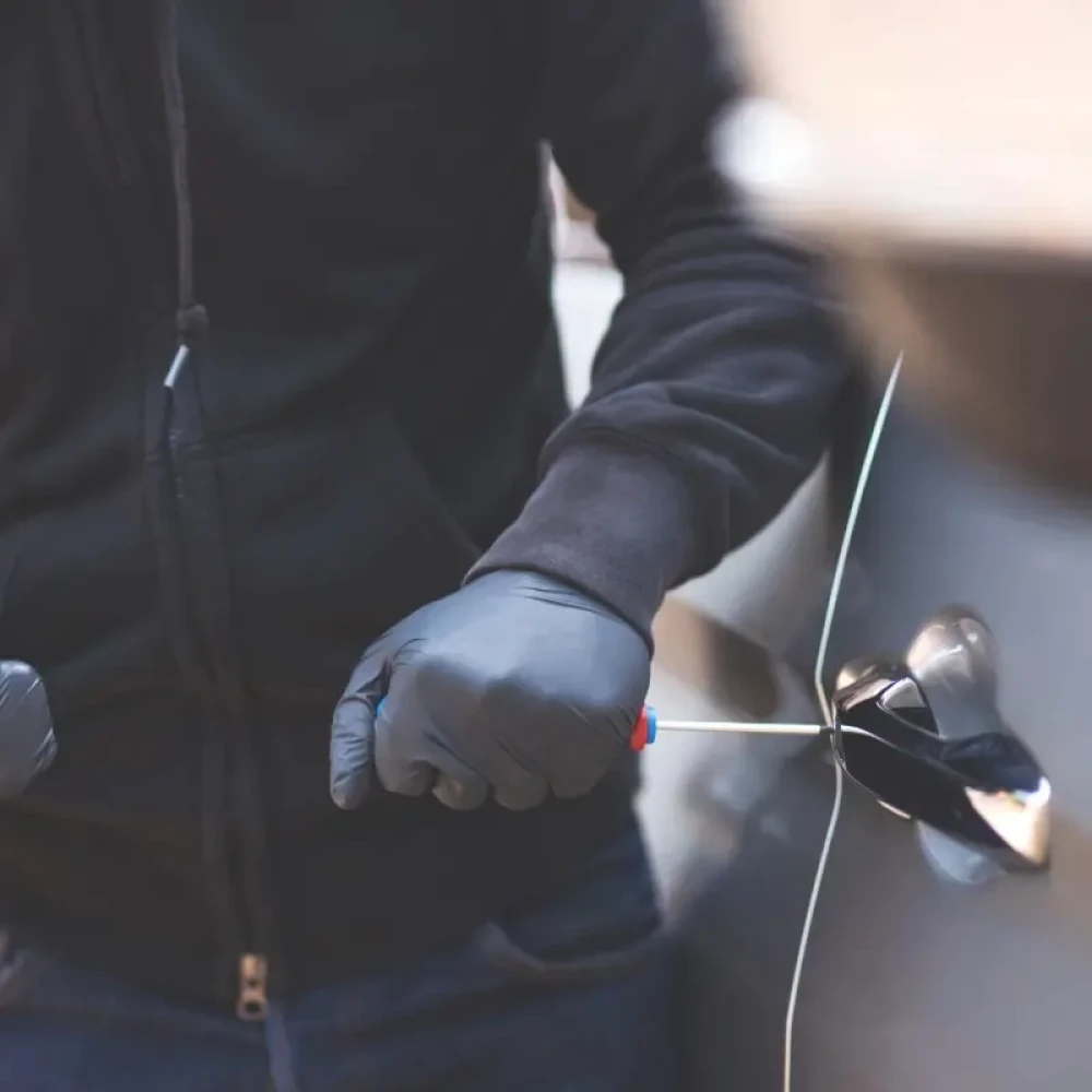 Car Thief attempting to Break into Vehicle