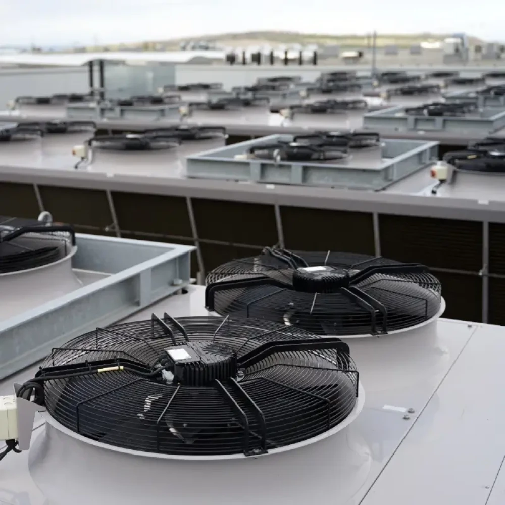 industrial condensers with fans on roof used in air conditioning