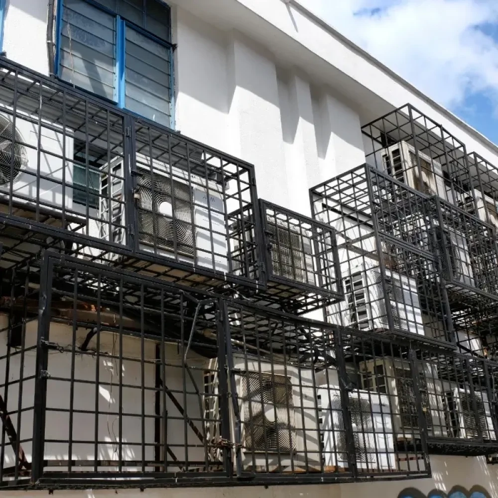 HVAC units in metal cages providing protection from copper theft & vandalism