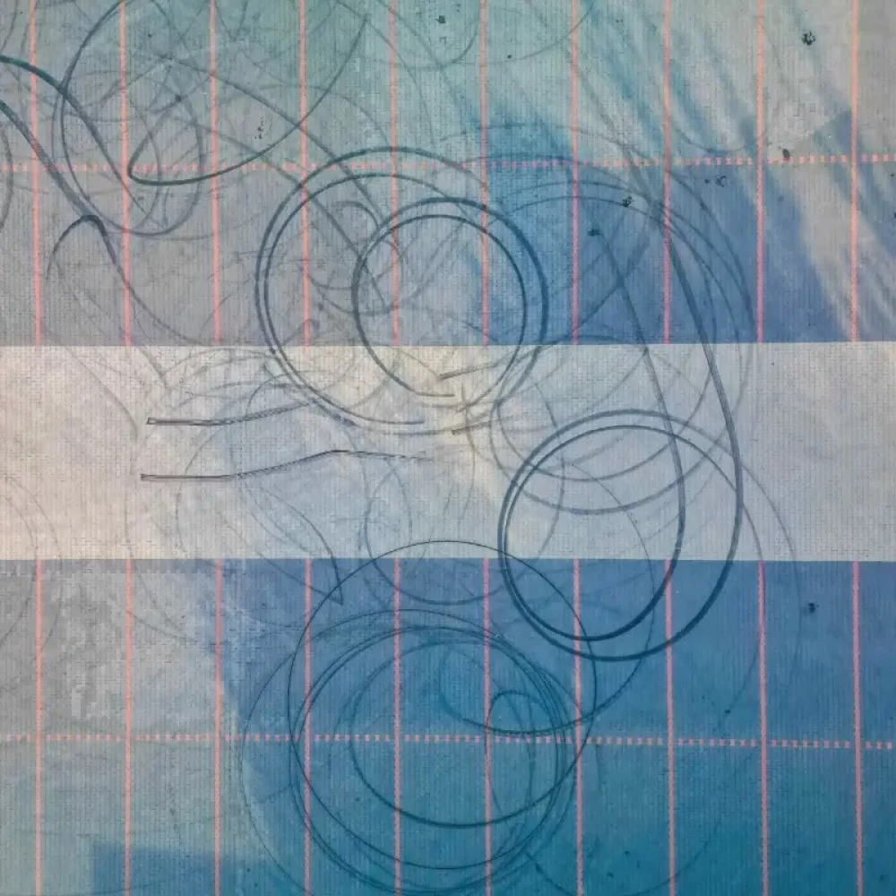 top down view of an empty car park with tire marks